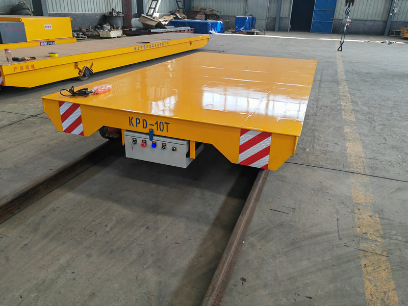 Pramoninio transporto sprendimas žemo įtampos geležinkelio perdavimo vežimėlis